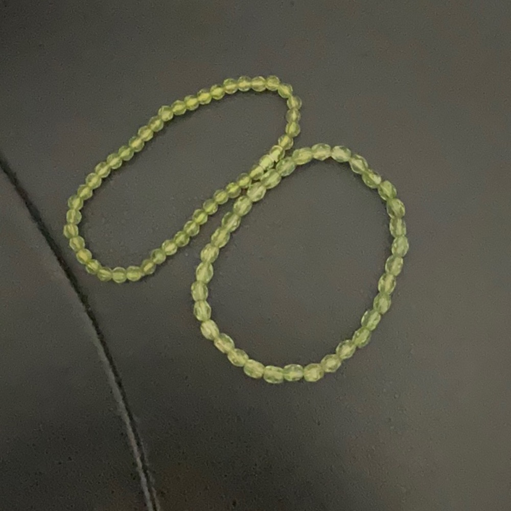 Green crystal bracelets, stretchy. Different bead sizes.